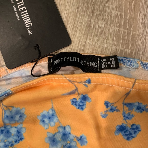 NWT Mustard Printed Jersey Ruched Tie Side Mini Skirt - Picture 6 of 6